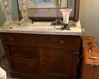 burled walnut chest with marble top.  Raccoon print 