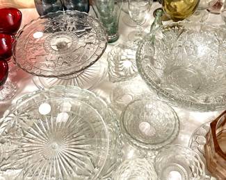 lots of glass and crystal platters and bowls