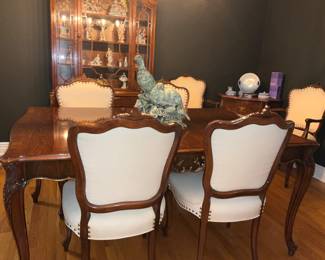 Romweber, French Provincial Louis XV,  Rosewood Table w/ 6 chairs & 2 leaves , Circa 1920s.  Matching Cabinet, Sideboard,  and cabinet. Great Condition.  