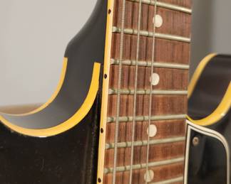 Gibson,  guitar. Serial # 47356.  Because of the large interest in both the Fender and the Gibson Guitar from around the country, we have elected to go to a sealed bid. They will will be available for preview till Saturday 1pm .