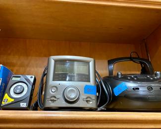 lots of small electronics, camera, radios, etc