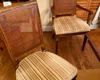 Ethan Allen dining table with two leaves, 8 chairs and a set of table pads