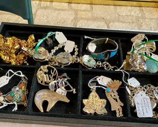 Silver, stones pendants and pins  