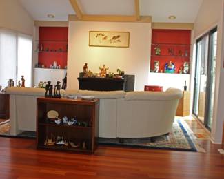 Living Room Overview with Sofa, Bookcase & Art