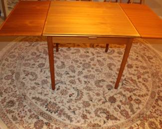 Table and Round Area Rug