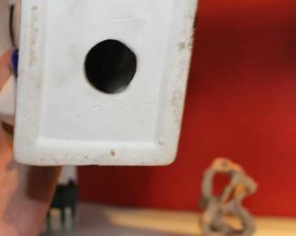 Signature on Bottom of Ceramic Warrior Figurines on Glass Shelf