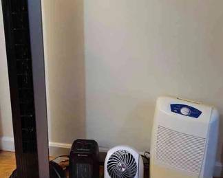 Portable Heater, Tall Oscillating Fan, Dehumidifier, And Vernado Fan 