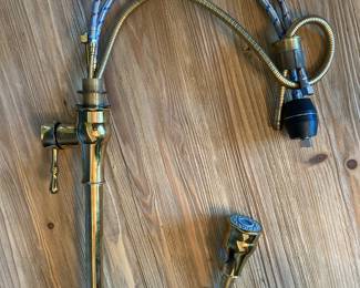 Brass kitchen faucet with pull down