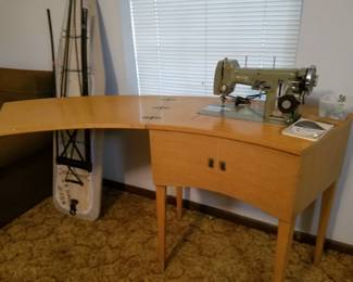 Groovy sewing machine cabinet