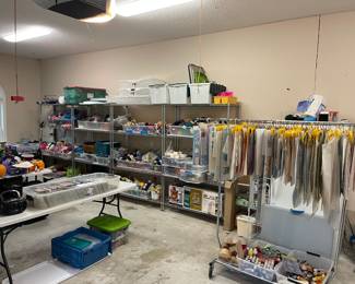 Wall full of yarn, needlepoint patterns 