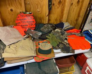 tables full of hunting clothes gear attire camo 