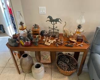 Table full of primitives and decoys / crocks 