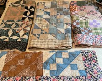 selection of hand made quilts 