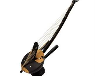 Lot 208   
Miniature Ebony Cora Instrument