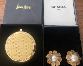 Neiman Marcus mirror; Chanel earrings