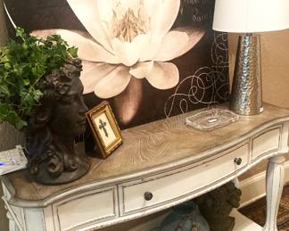 This lovely entrance table coordinates with the coffee table and an end table.