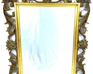 Ornate gilt wood framed beveled mirror by designer John Richard 