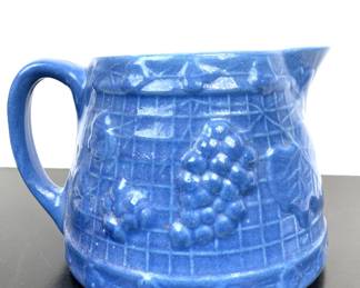 Antique stoneware pitcher by UHL Pottery. Grapes Clusters and Lattice