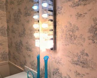1970s Hollywood Regency bathroom light fixture.......To register in order to place bids go to www.capitolsalesservices.hibid.com 