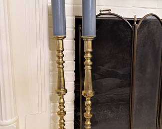 Pair of monumental brass candle holders