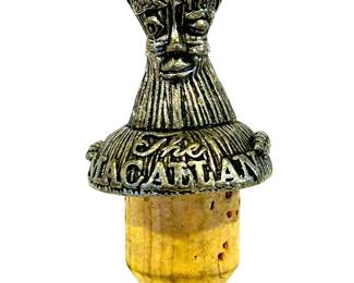 MaCallan bottle stopper........To register in order to place bids go to www.capitolsalesservices.hibid.com 