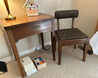 	#40	Singer Golden Touch and Sew sewing machine with cabinet and chair	 $60.00 				
