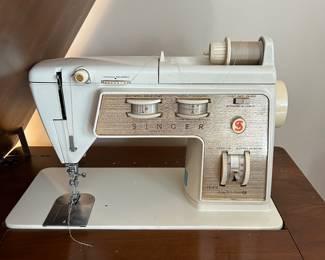 	#40	Singer Golden Touch and Sew sewing machine with cabinet and chair	 $60.00 				