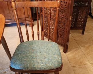 One of the High Back Chairs that goes with Dining Table