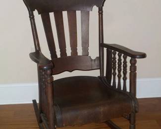 Antique Handcrafted Dark Wood Rocking Chair