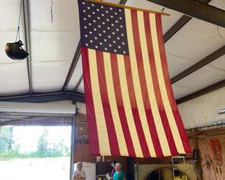 American flag. -if you can get it down!!