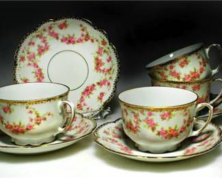 Lot 050  
Antique Bridal Rose Tea Cup and Scalloped Saucer Germany Set of 4
