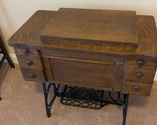 Antique sewing machine cabinet