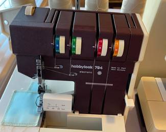 Working Hobbylock 794 serger with large lot of thread spools
