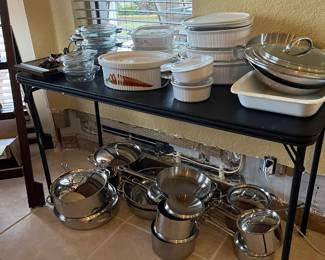 Pots, pans, Corning ware, baking pans and so much more in this packed kitchen.