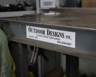 Solid Rolling Metal Top Work Table by Outdoor Designs Inc.