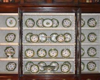 Extensive English 19th Century Porcelain Service,  Consisting of 24 Dinner Plates, 2 Oval Serving Dishes, Large Oval Pedestal Serving Bowl, Four Square Serving Dishes, Three Pedestal Compotes, Covered Sauce Tureen On Stand, & A Rectangular Two Handled Serving Dish, Circa 1835.  