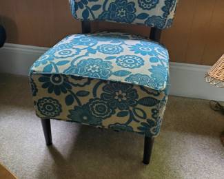 This is a reproduction of a MCM vanity chair.  It is ready for reupholstery, otherwise in good shape.