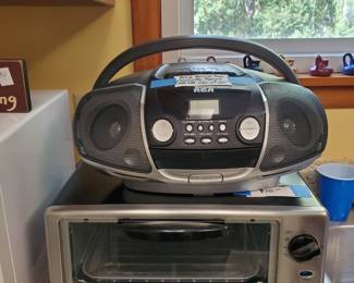 Solid little RCA boombox - Radio am/fm, cassette, cd,  Super clean little toaster oven.
