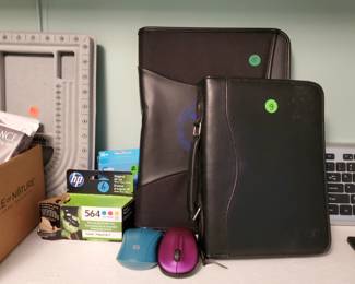 Printer Ink, blue tooth mice, black portfolio and date book cover.