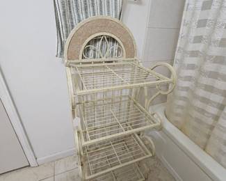 Metal and stone towel rack. Shelves lift up.