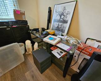 Glass  console with TV mount. Stereo system.