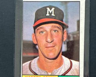 1961 Topps #200: Warren Spahn. Elected to the Hall of Fame in 1973. He is the winningest left-handed pitcher in MLB history with 363 wins. Topped the 20-win mark 13 times in his career and was one of the most dominant NL pitchers of any era. He pitched for the Boston/Milwaukee Braves (1942, 1946-1964) for virtually his entire career, earning 17 All-Star selections. He was the ace of the Braves pitching staff helping the heavy hitting squad to three NL pennants and one World Series title in 1957. He posted a 21-11 record with 18 complete games, 130 strikeouts and a 2.69 ERA and won the 1957 Cy Young Award.