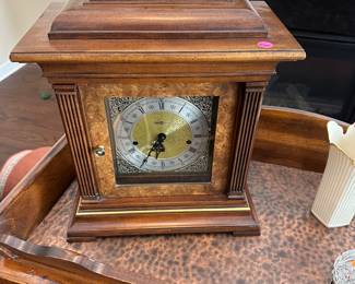 W56 - $100 Howard Miller Mantle Clock. 