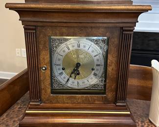 W56 - $100 Howard Miller Mantle Clock. 