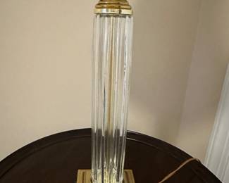 W25 - $30 Table lamp with metal base and glass. Measures 31" tall. 