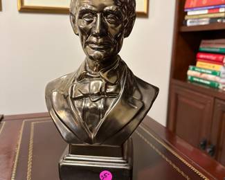 W53 - $35 Porcelain Bust. Painted with Metallic look 