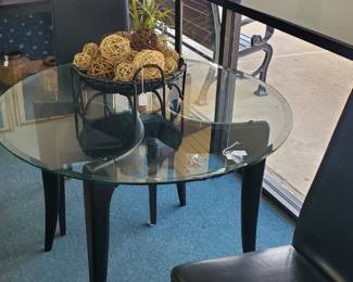 No. 20) contemporary round (42") glass-top black table with a pair of black chairs - $300 (Take 50% off)
