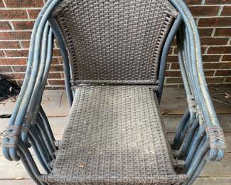 4 outdoor chairs with a matching table. Just need a good pressure washing!