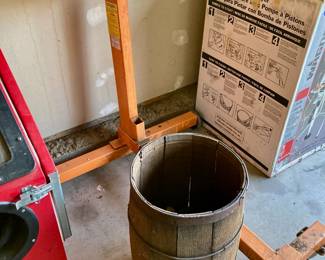 nail peg barrel with many railroad pegs inside