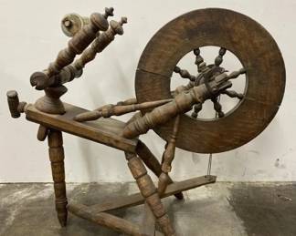 Antique wooden spinning wheel